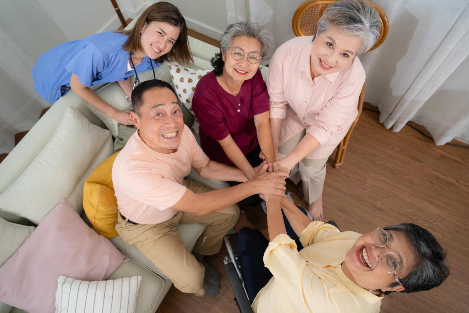 top-view-of-asian-senior-family-holding-hands-toge-2025-01-08-09-04-55-utc-2.jpg